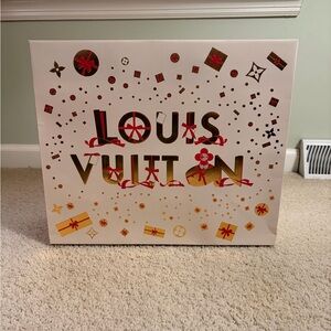 Louis Vuitton Festive Gift Bag with Red and Gold Accents